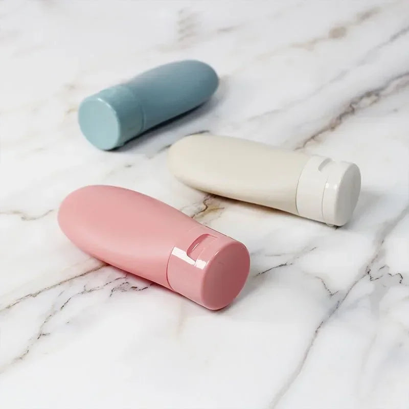 Travel Squeeze Bottles Set - 4 Pack 60ml Refillable Soft Lotion Containers for Shampoo & Toiletries