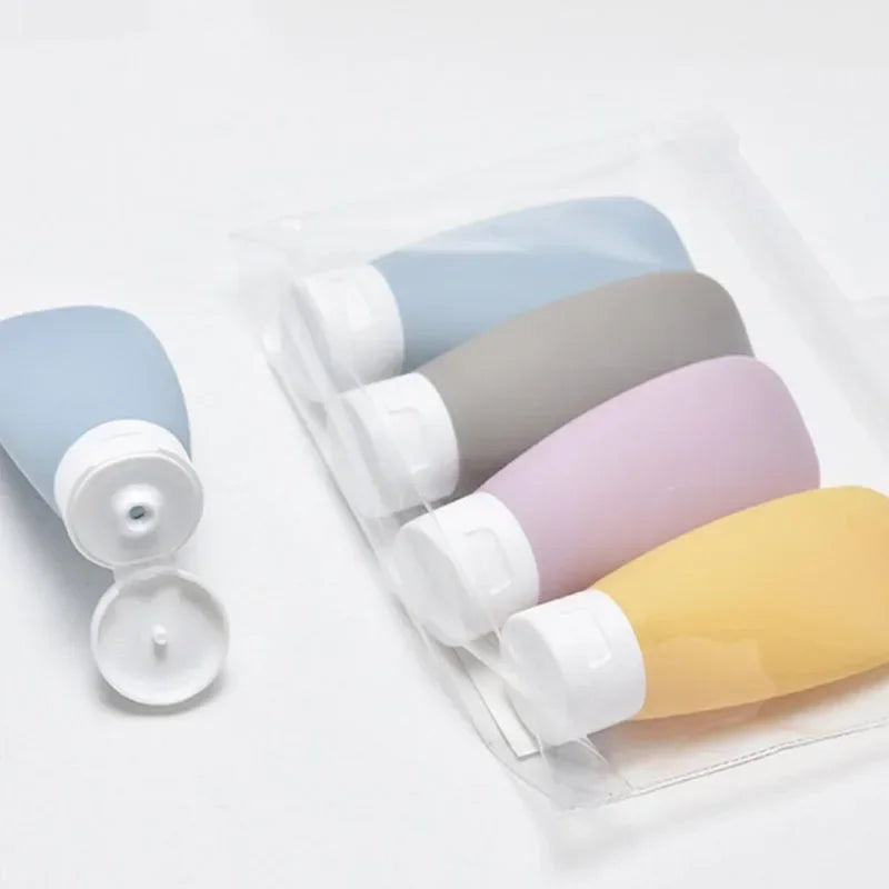 Travel Squeeze Bottles Set - 4 Pack 60ml Refillable Soft Lotion Containers for Shampoo & Toiletries