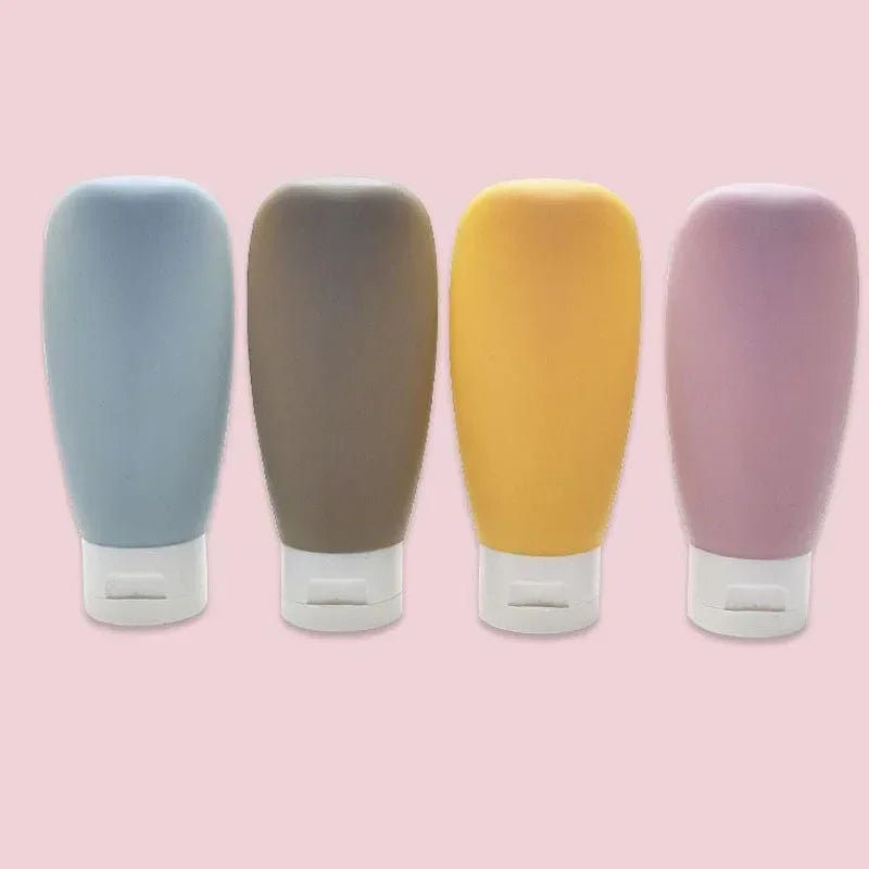Travel Squeeze Bottles Set - 4 Pack 60ml Refillable Soft Lotion Containers for Shampoo & Toiletries