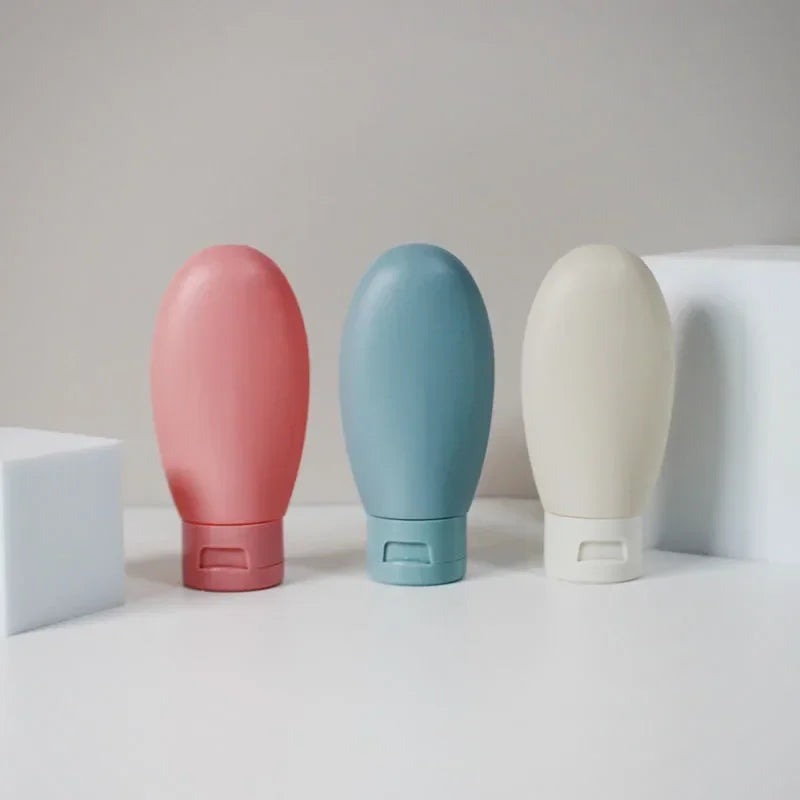 Travel Squeeze Bottles Set - 4 Pack 60ml Refillable Soft Lotion Containers for Shampoo & Toiletries