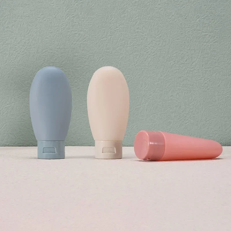 Travel Squeeze Bottles Set - 4 Pack 60ml Refillable Soft Lotion Containers for Shampoo & Toiletries