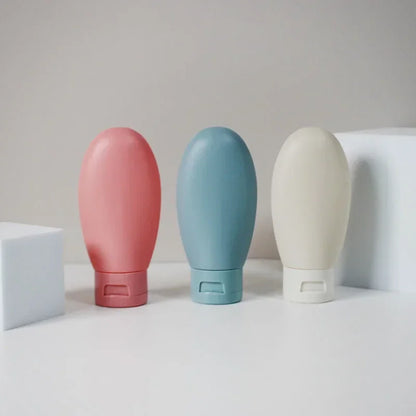 Travel Squeeze Bottles Set - 4 Pack 60ml Refillable Soft Lotion Containers for Shampoo & Toiletries